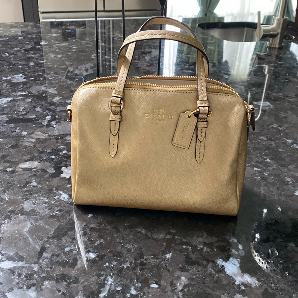 Gold coach never been worn small bag
